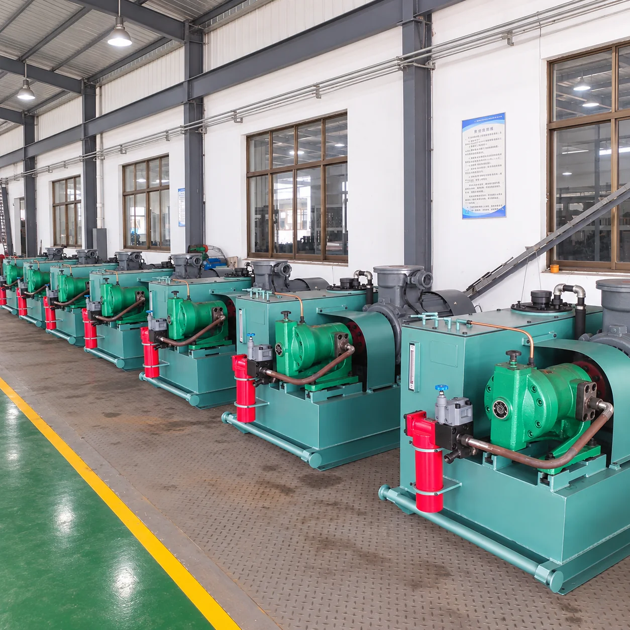 Row of hydraulic power units in the workshop