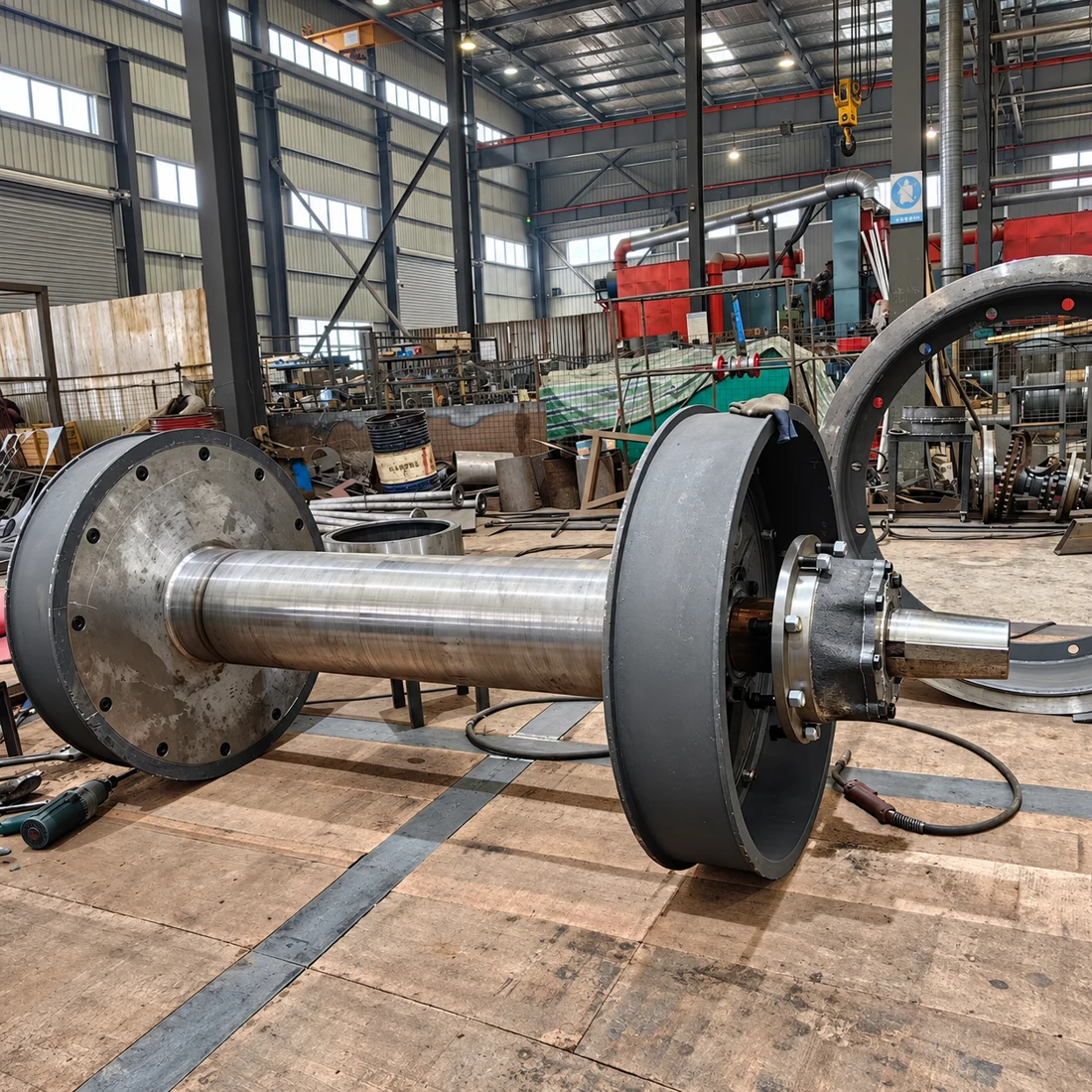 Drawworks drum shaft and brake components in the workshop